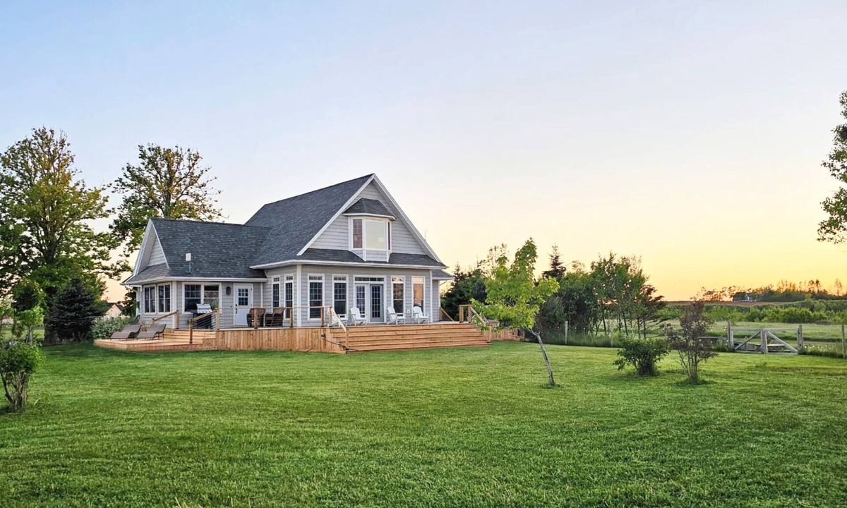 Malpeque House | Bright & Airy Beach House – Bay Views, Wraparound Deck & Room to Unwind
