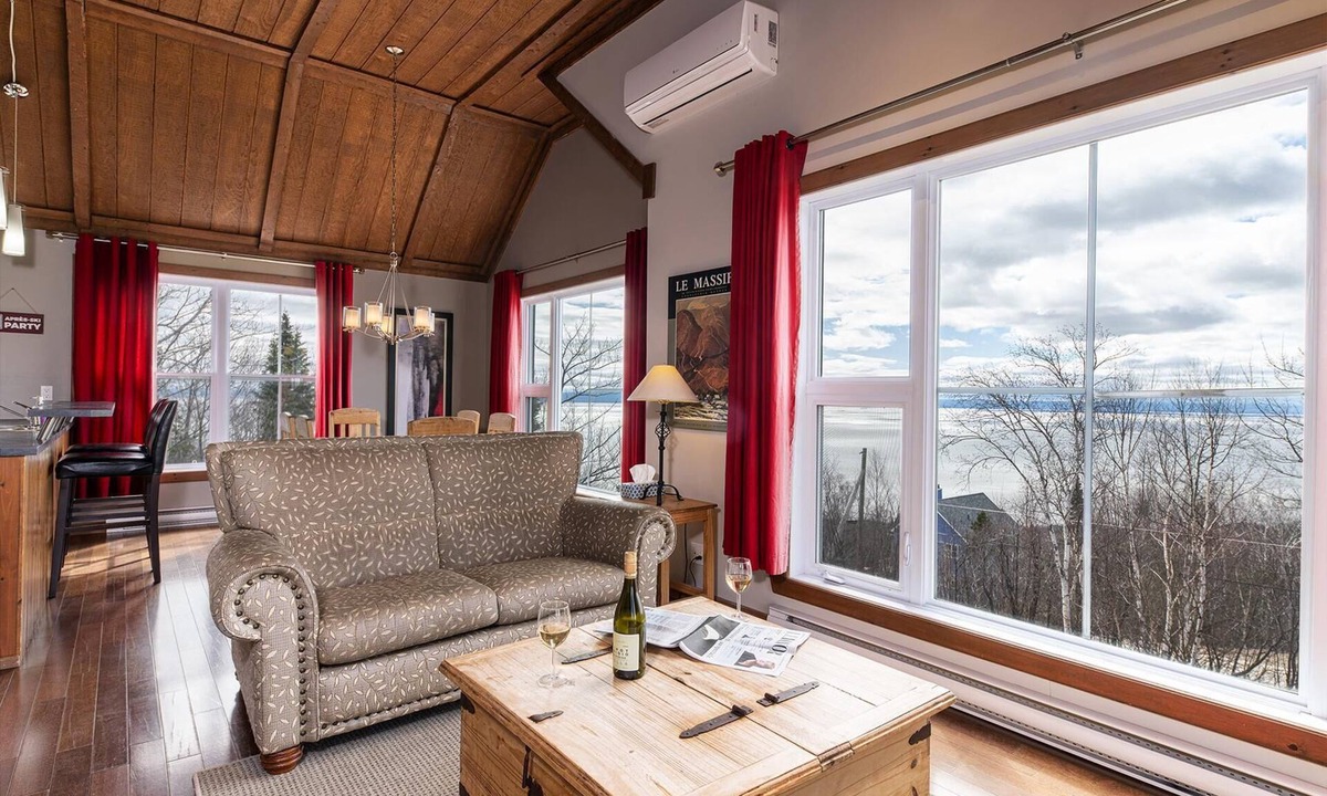 Petite-Riviere-Saint-Francois Condo | Condo 120H: Riverfront Views, Terrace & BBQ