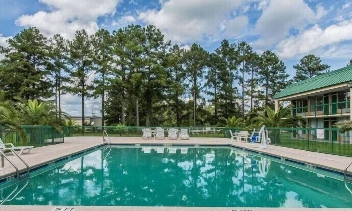Douglas Hotel | Delight in Pet-Friendly Four Double Queen Bed Rooms w/Pool Outdoor Pool