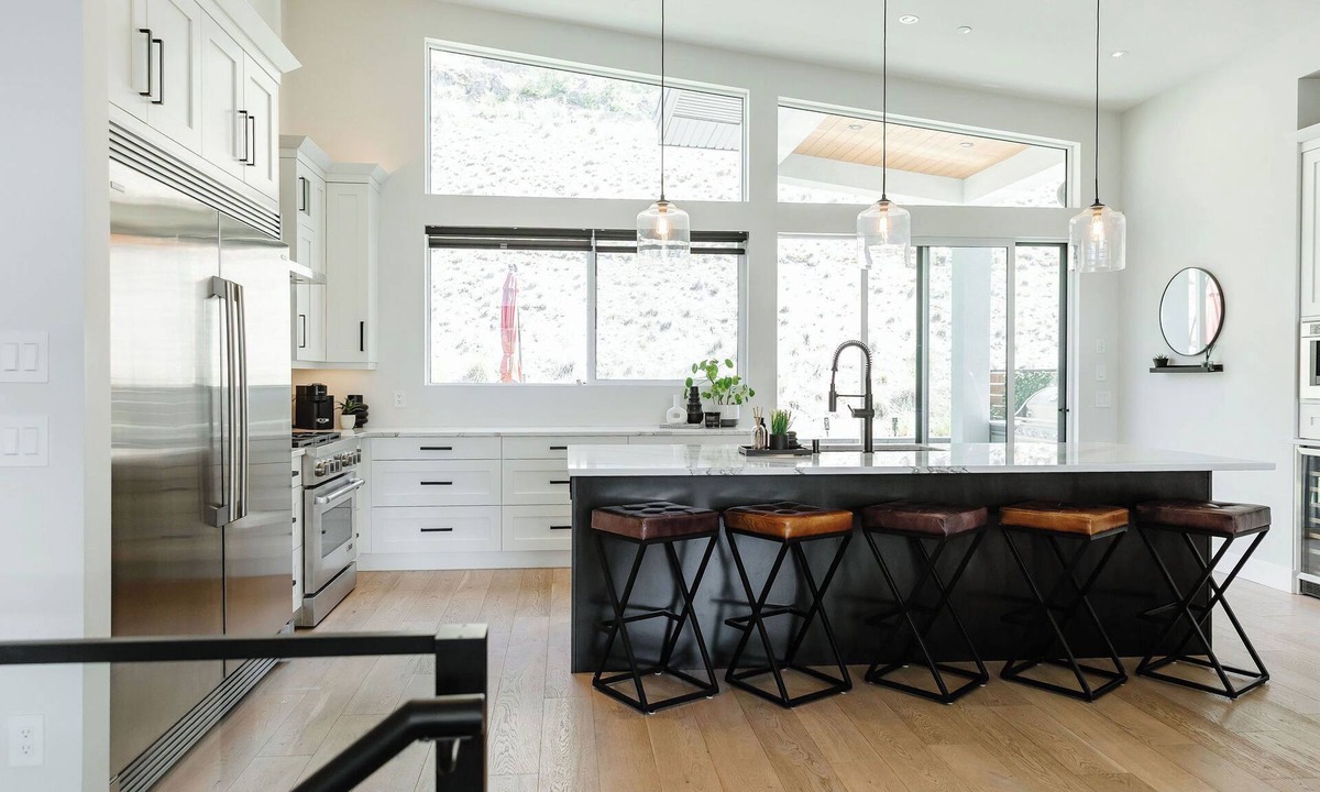 McKinley House | Designer home above McKinley Beach with sweeping lake views, private hot tub, putting green, Traeger smoker, pool or ping pong, & chef kitchen with JennAir. Three bedrooms sleep 6 comfortably, plus sofa bed for 2. Quiet community, 15 min to downtown.