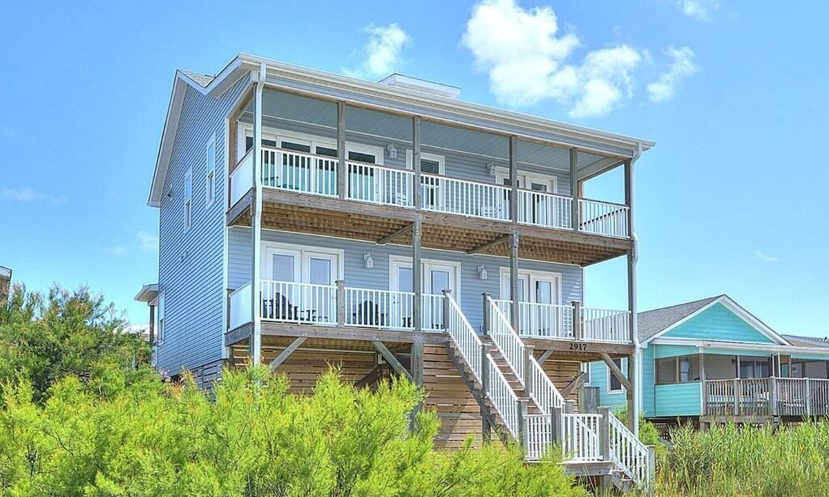 Long Beach House | Experience oceanfront bliss at Blue Yonder, a spacious 4-bedroom retreat in Oak Island.