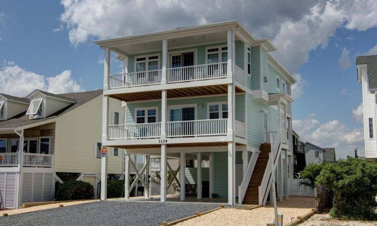 Holden Beach House | Experience seaside charm at "Welcome Home" in Holden Beach, a spacious 4BR retreat!