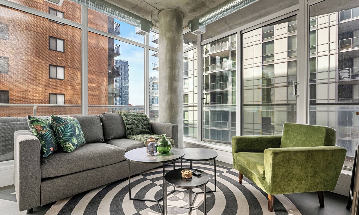 East Village Apartment | Industrial 1BR w Office, Views, AC, XL Patio