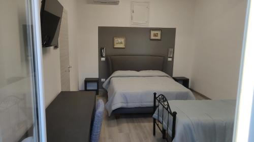 Ficarazzi House | La Rondine Bed