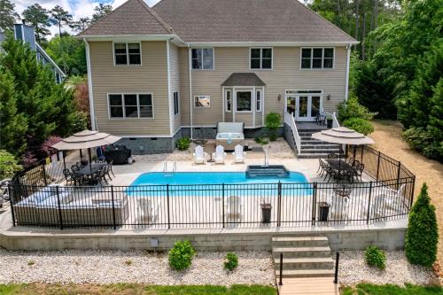 Halifax County House | Lakefront Luxury Flat Lot, Heated Pool, Hot Tub & Game Room Fun Dock!