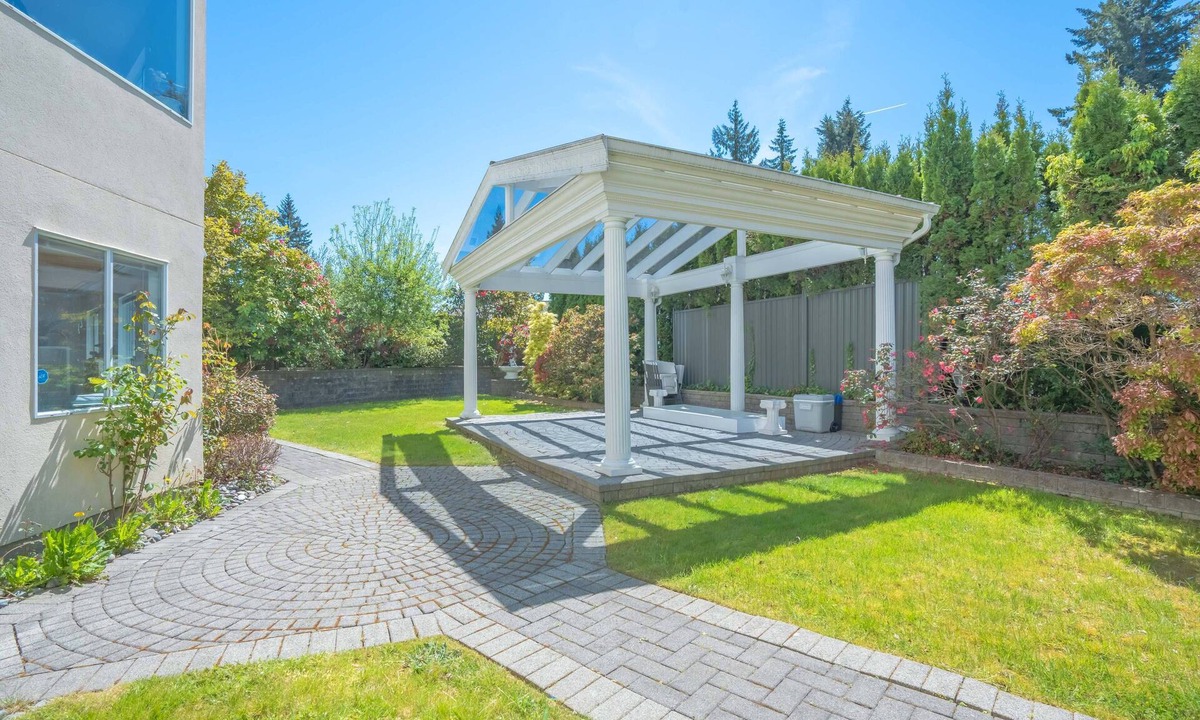 Upper Lonsdale House | Large fully renovated 2-bedroom ground-level suite with a fenced backyard