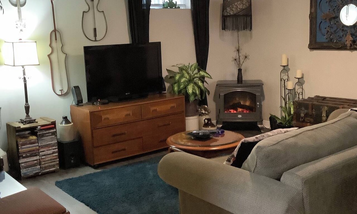 Rosemount Apartment | Large private fenced yard with guest patio, fire pit and surrounding gardens.