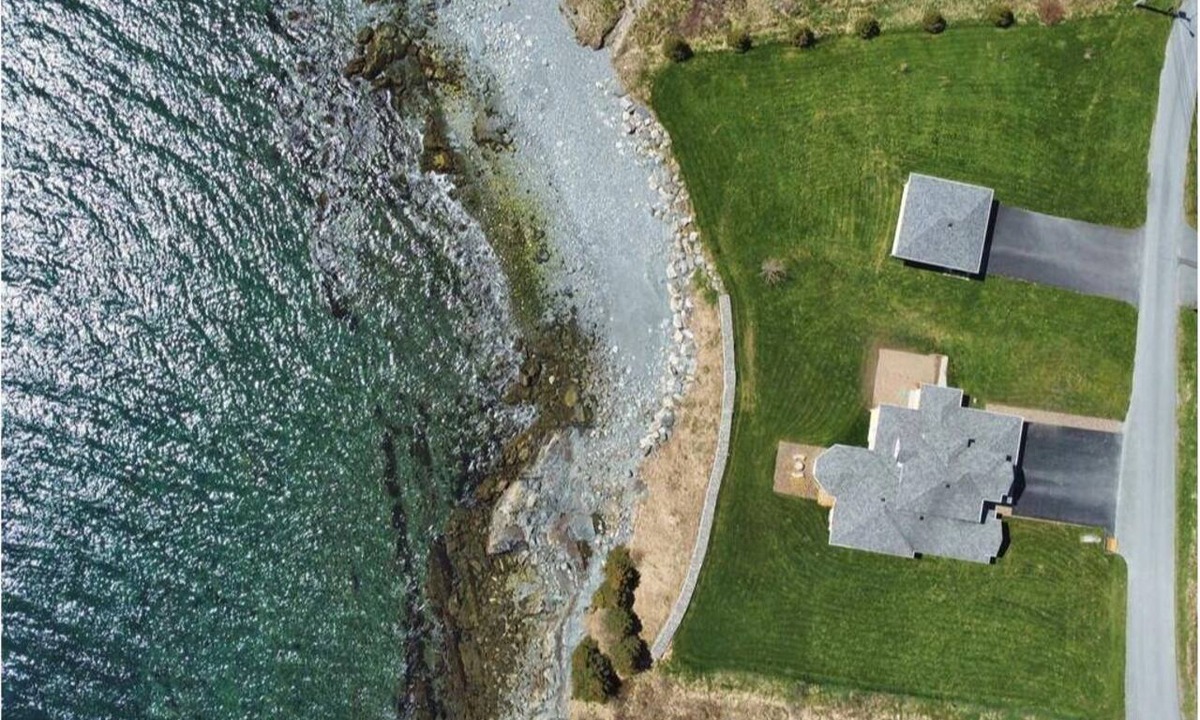 Bay Roberts House | Oceanfront, direct shoreline access, main floor master, and full ensuite.