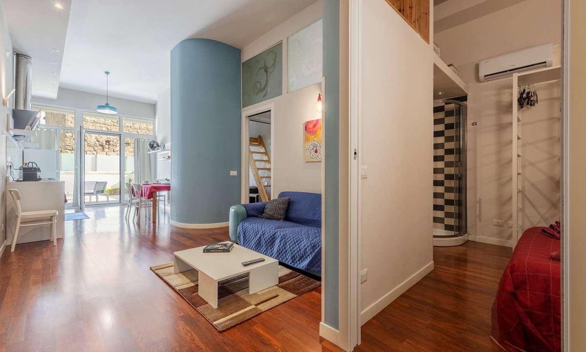 Palermo Apartment | Sacra Famiglia Ausonia Apartment: History and Modern Comfort by the Sea