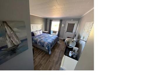 Rusticoville Hotel | The Pines Motel and Cottages