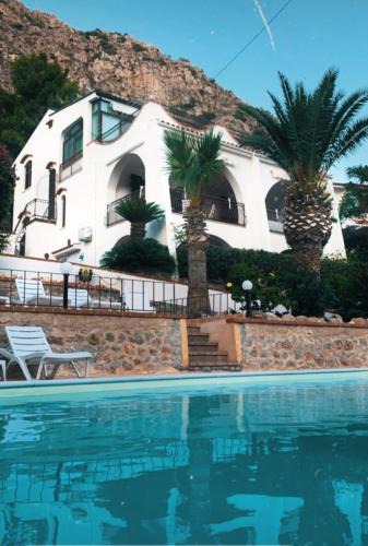 Capo Zafferano Apartment | Villa del Golfo Urio with swimming pool shared by the two apartments it is essential to have a car