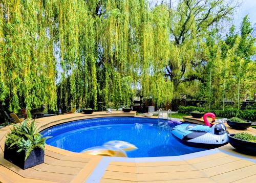 South Pandosy House | Waterfront Oasis with Pool, Hot Tub & Pet Friendly