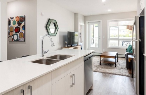 Shaganappi Apartment | $0 Cleaning Fee w/ Electric Fireplace and Pull Out Sofa