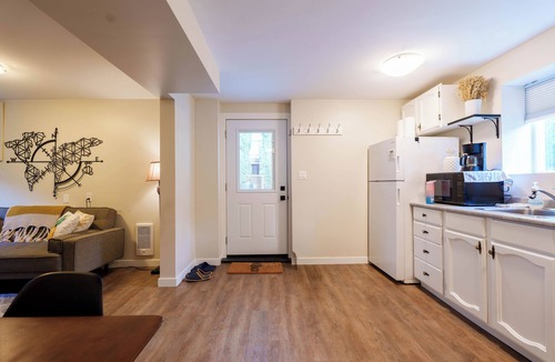 Departure Bay Apartment | A bright and cozy 1-bedroom basement suite is nestled in a lush garden setting