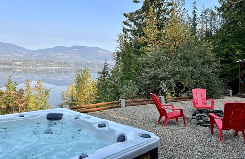 Blind Bay Cabin | A cozy, romantic lake view log cabin with hot tub & wood burning fireplace.