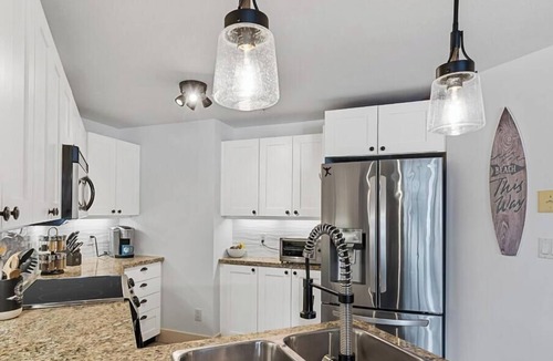 Westbank Condo | Amazing professionally renovated and furnished on the water!