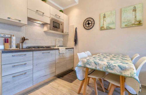 Lido Apartment | Apartment 'Alghero Via Lido' with Shared Pool and Air Conditioning