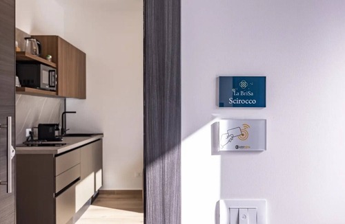 Capo d'Orlando Apartment | Apartment 'La Brisa Apartments - Scirocco' with Mountain View, Wi-Fi and Air Conditioning
