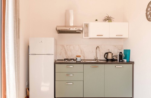 Montallegro Apartment | Apartment 'Le 3 Rose - Alba' with Lake View, Wi-Fi and Air Conditioning