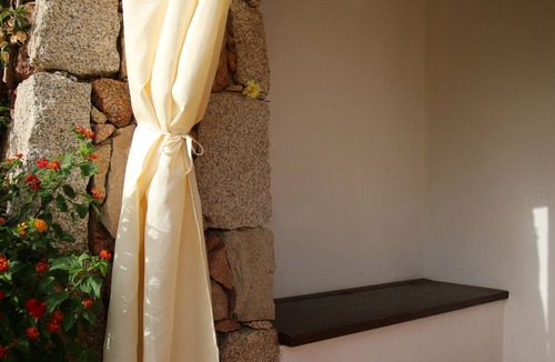 Porto San Paolo Apartment | Appartamento a Pochi Passi dal Mare con Patio e Giardino Privato
