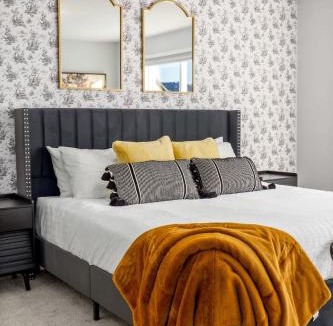 Airdrie House | Arcade King Bed Espresso Maker Family Friendly