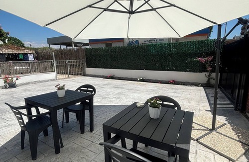 Nettuno House | At 100 mt from the sea and train station, room with all amenities