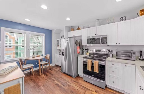 Bermuda Bay House | Aviation Themed Townhome w/Waterpark & Game Room - Pet Friendly