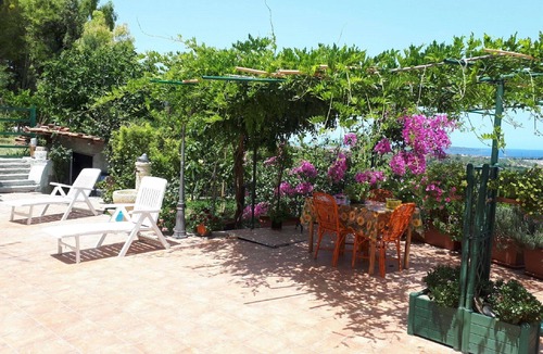 Condro Apartment | B & B L'Ulivo - Attic in villa with sea view and Aeolian islands with terrace and garden