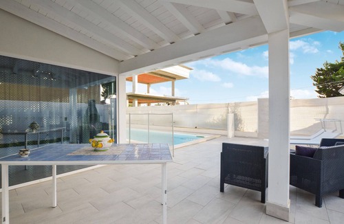 Realmonte House | Bright and modern dream of a vacation home with pool, close to the beaches.