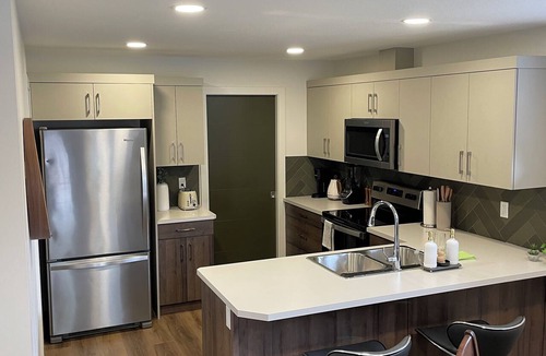 Lethbridge House | Bright Walkout Suite | Near U of L & YMCA