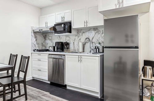 Cranston Cottage | Charming Basement Suite With Parking & Laundry