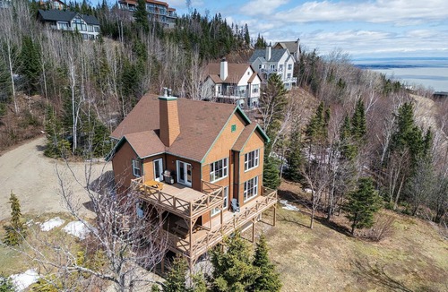 Petite-Riviere-Saint-Francois Condo | Condo 120H: Riverfront Views, Terrace & BBQ