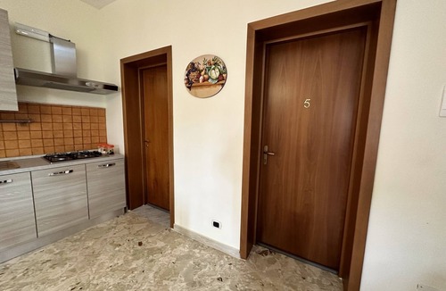 Gela Apartment | Cosy Abode: Apartment in the Square with View, Kitchen, and Exclusive Terrace