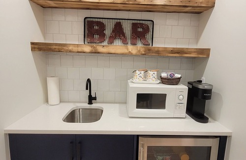 Southeast Calgary House | Cozy basement unit near restaurants, bars, stores, bus stations, and hospital.