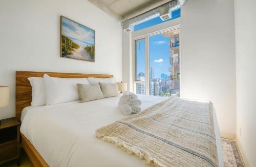 East Village Apartment | Cozy Downtown Retreat with Stunning River Views