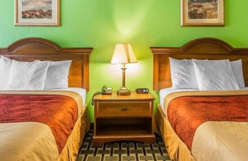Douglas Hotel | Delight in Pet-Friendly Four Double Queen Bed Rooms w/Pool Outdoor Pool