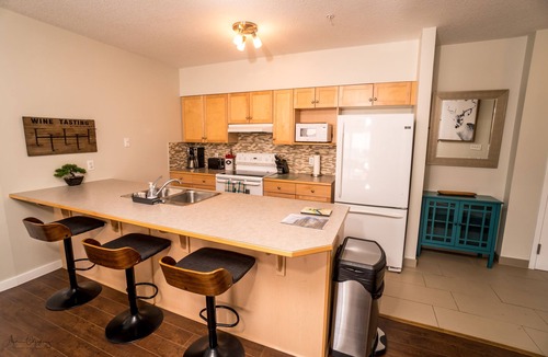 Canmore Condo | Downtown Canmore Vacation Retreat with Roof-top Hot Tub