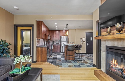 Canmore Condo | Enjoy this Stunning Condo with Hot Pools, Steam Room, Onsite Spa and Restaurant