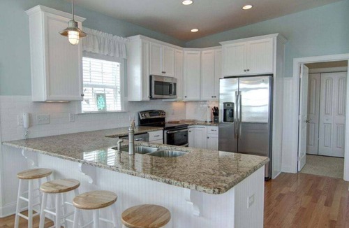 Holden Beach House | Experience seaside charm at "Welcome Home" in Holden Beach, a spacious 4BR retreat!