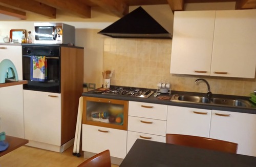 Zafferana Etnea Apartment | Family lofts at the foot of Mount Etna. Private parking space and scenic garden.