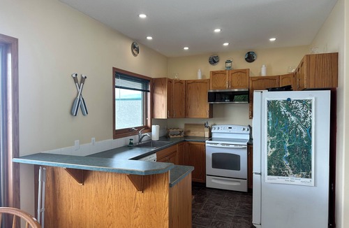 Blind Bay Condo | Gorgeous Lakefront 2 Level Penthouse Condo w/2 Private Balconies & Buoy!