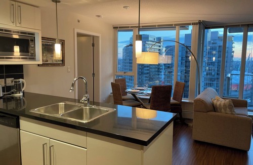 Central Condo | Great View | Two Bedrooms | Next to BC Place | Air Conditioners | Parking