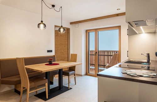 Funes Apartment | Holiday Apartment "Planerhof Apartment Lilie" with Mountain View, Shared Terrace and Wi-Fi