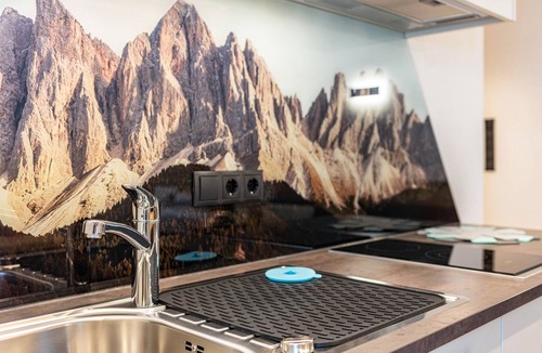 Funes Apartment | Holiday Apartment "Planerhof Apartment Lilie" with Mountain View, Shared Terrace and Wi-Fi
