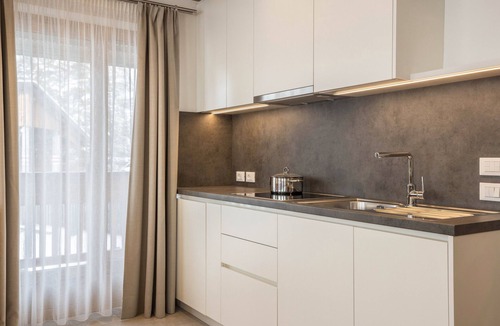 San Vigilio Apartment | Holiday Apartment "Runcac Plaies" with Mountain View, Wi-Fi & Balcony