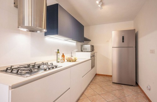 Capo Mannu House | Just 50 steps from the beach: Vacation Home for 9 Guests & BBQ