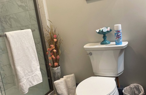 Myrick Estates House | Lakefront - private suite & entrance to one bedroom & private bath- hot tub