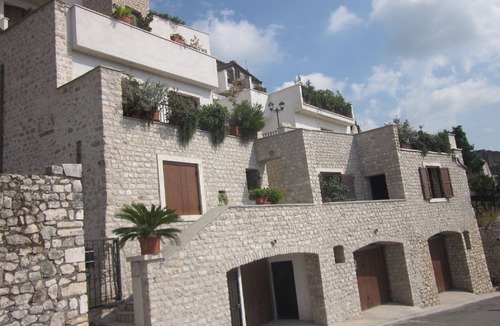 Sermoneta Apartment | Large apartment in a medieval stone Court, terrace, great view, pool use