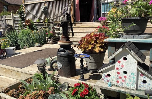 Rosemount Apartment | Large private fenced yard with guest patio, fire pit and surrounding gardens.