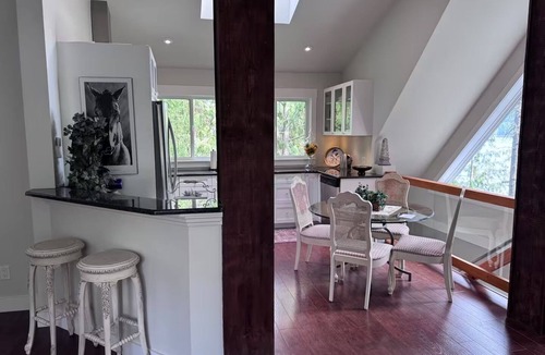 Anglemont House | Luxe two-storey home provides a beautiful modern unique romantic getaway!